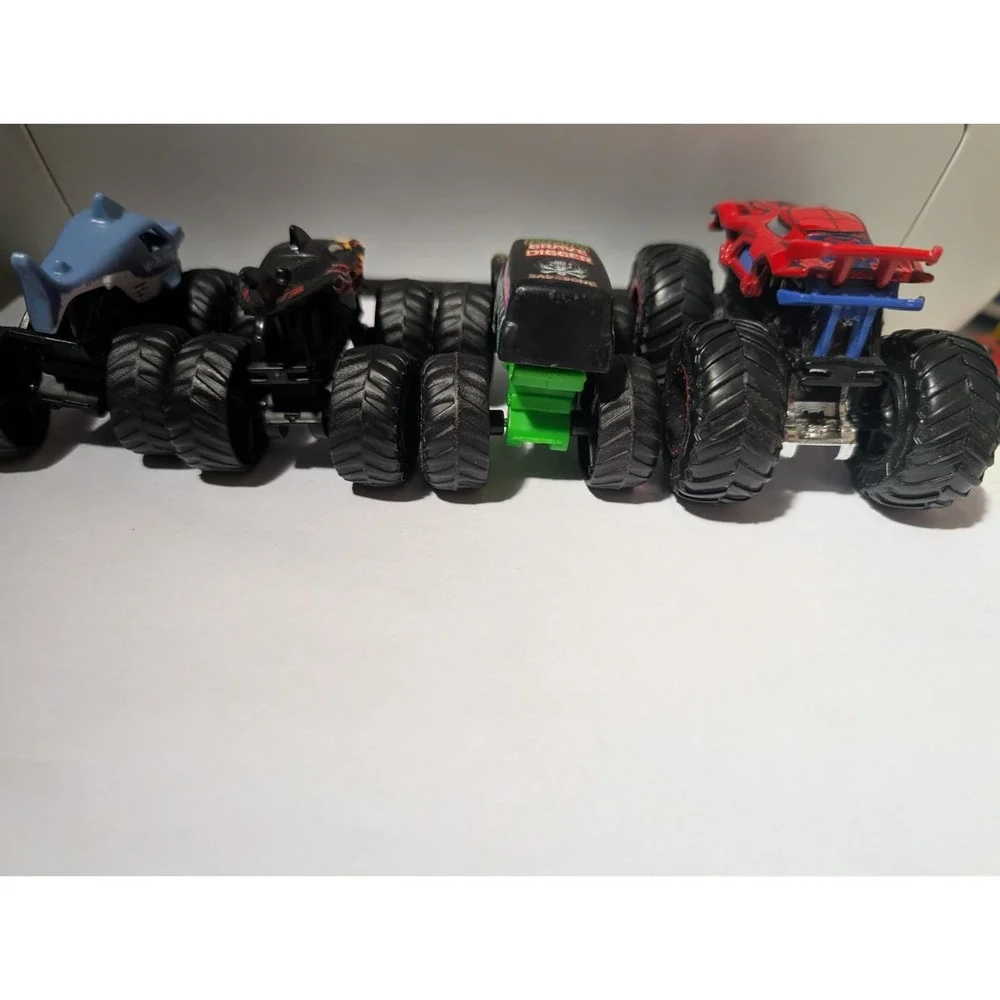 Monster Jam Hot Wheels Monster Truck Lot of 4 Grave Digger Megalodon Spiderman